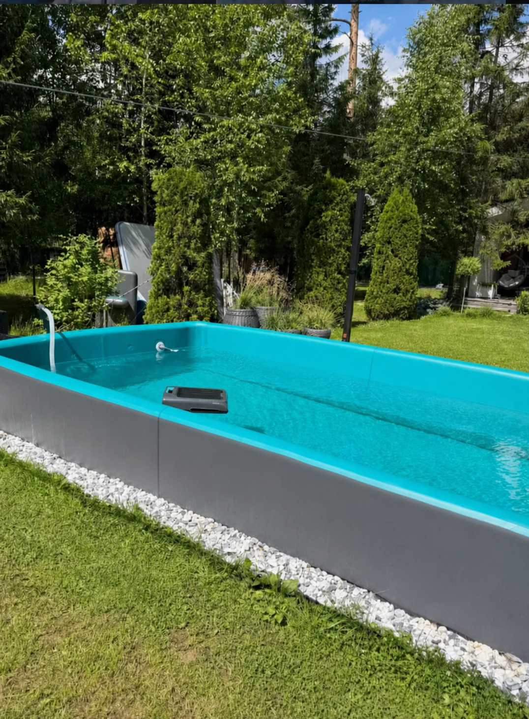 Helyora rectangular above-ground pool installed in the garden